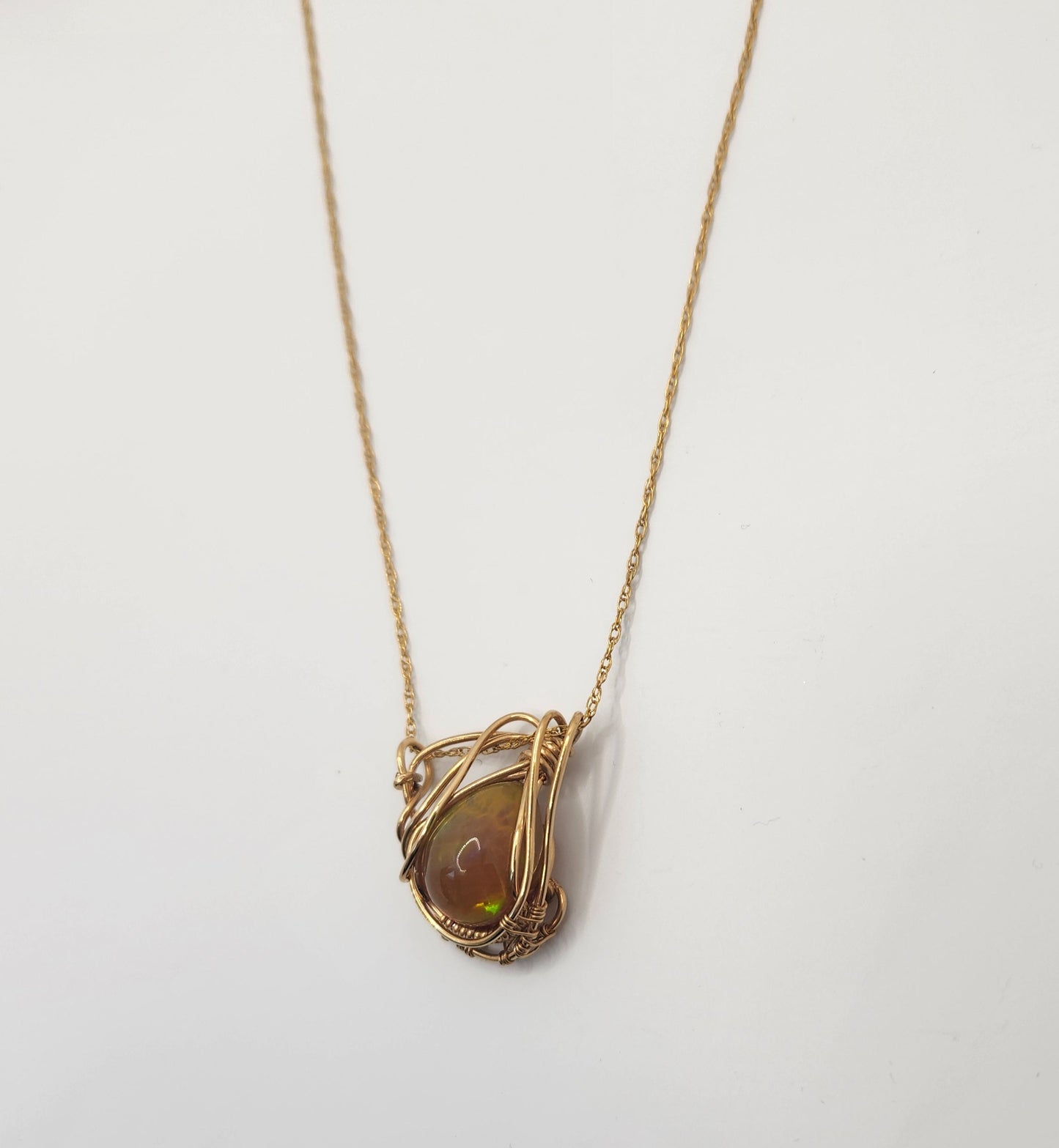Deep Mysterious color Ethiopian Opal + 14k Gold filled Wire Wrapped Pendant