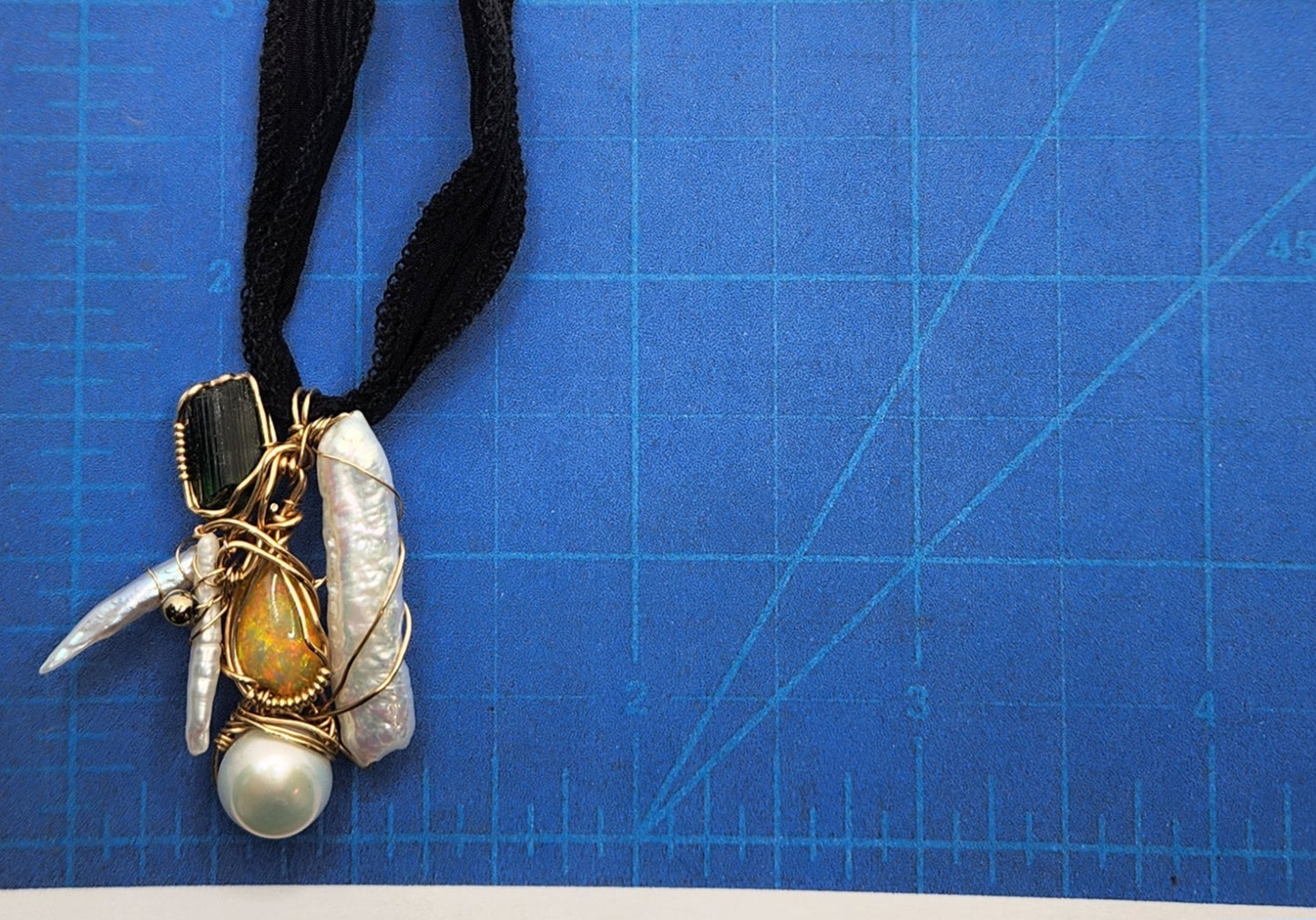 Beauty  harmony of Emerald+ Ethiopian Opal + pearls